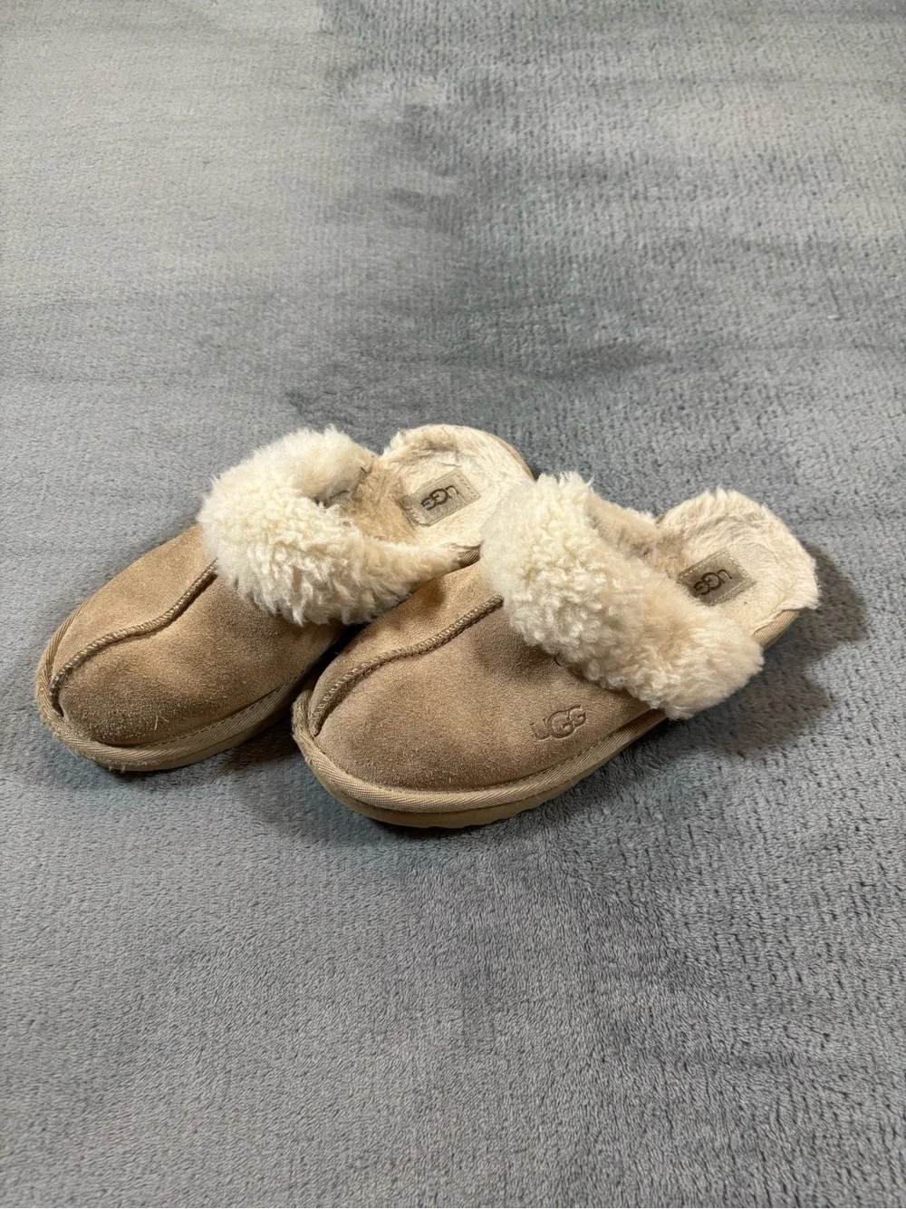 UGG Kids Slip-On Shearling Lined Slippers in Chestnut Tan